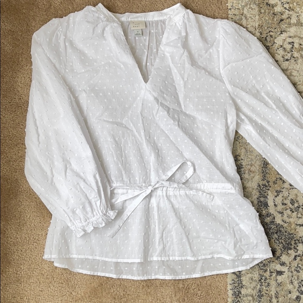 White dot ruffle blouse